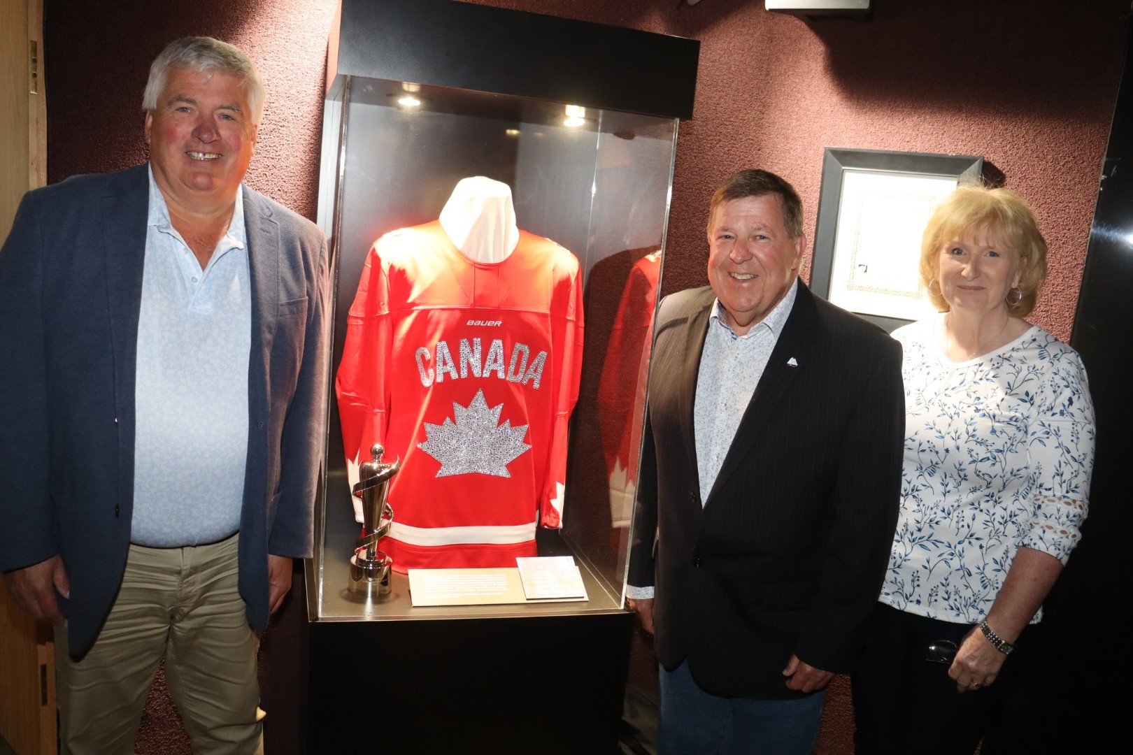 Municipality of Cumberland Mayor Rod Gilroy (left) is joined by Coun. Scott Lockhart and Coun. Angel McCormick in helping unveil the new Juno Lifetime Achievement Award exhibit at Springhill’s Anne Murray Centre. Darrell Cole – Municipality of Cumberland photo